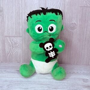 Gemmy zombie baby eating bear Skelton cookie animated plush Halloween decoration